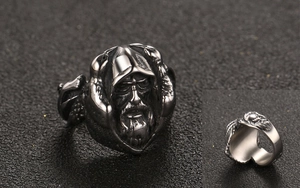 Detailed close-up of a vintage gothic titanium steel ring featuring a hooded wizard design