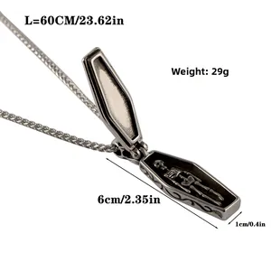 Detailed macro view of an openable silver gothic coffin pendant with a skeleton inside