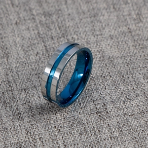 Modern stainless steel ring with blue center groove and polished silver edges