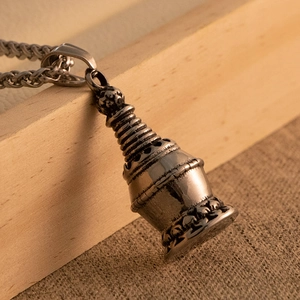 Retro stainless steel stupa pendant necklace with lotus base and intricate carvings
