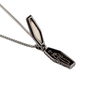 Gothic titanium steel coffin pendant necklace with interior skeleton and vintage vine motifs