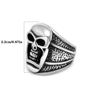 Macro shot of punk style steel skull ring showing 2.2cm height and honeycomb texture