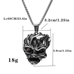 Détails du pendentif masque de démon punk avec dimensions et petit bijou rouge