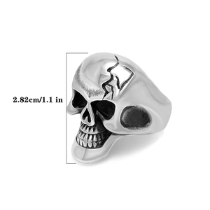 Macro view of vintage skull ring showing dimensions of 2.82cm height and steel texture