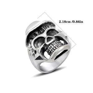 Detailed macro view of vintage silver skull ring with top hat and size measurements