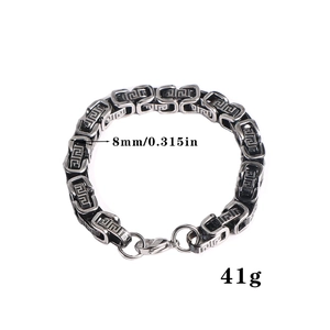 Detail of 8mm men's Byzantine chain bracelet with Greek meander pattern engraving