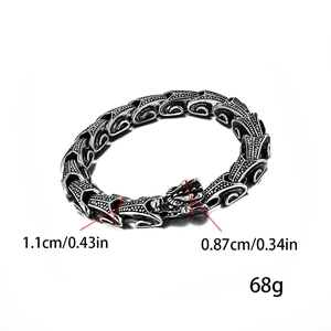 Detail of dragon head bracelet showing dimensions 1.1cm width and 68g weight