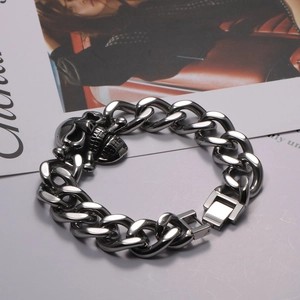 Men's punk stainless steel Cuban chain bracelet with realistic skull charm