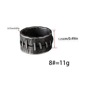Detail showing vintage steel ring dimensions width 1.25cm and weight 11g with texture