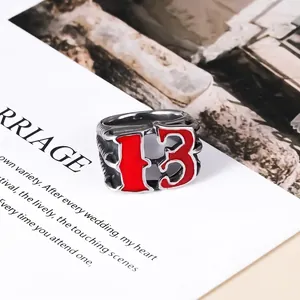 Vintage stainless steel ring with red number 13 in a bold punk biker street style