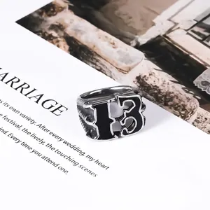 Gothic stainless steel ring for men featuring number 13 with black oil drip and side texture
