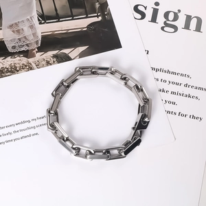 Polished stainless steel square link chain bracelet for men with a minimalist industrial look