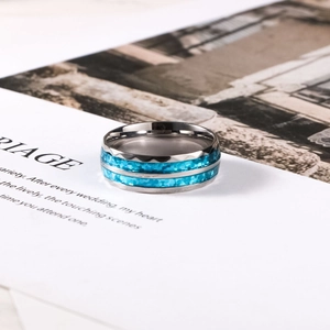 Polished stainless steel men's ring with dual blue shell inlay and geometric faceted edges