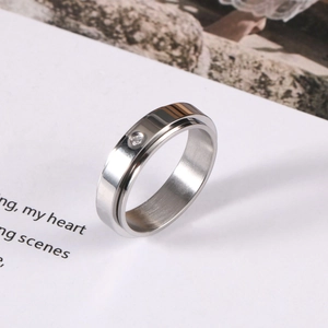 Minimalist spinning stainless steel couple ring with round zircon inlay in silver finish