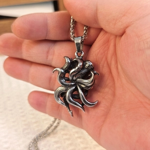 Retro stainless steel nine-tailed fox pendant necklace with a vintage silver finish