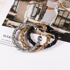 Three-piece set of woven stainless steel mesh open bangles in gold, silver, and black finish