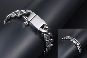 Detail of industrial titanium steel Cuban link bracelet with large square buckle clasp