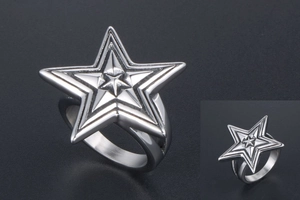 Macro detail of tiered silver star rings made of industrial grade stainless steel