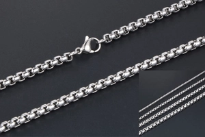 Detailed close-up of a silver stainless steel box chain necklace with a lobster clasp