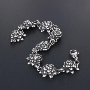Vintage oxidized silver stainless steel bracelet featuring 3D carved gothic roses