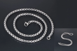 Close-up of industrial silver stainless steel box chain necklace with lobster clasp