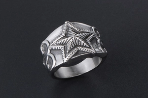 Detailed view of punk style stainless steel ring with embossed five-pointed star design