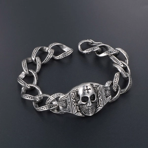 Bracelet crâne punk vintage en argent vieilli avec détail de croix et maillons gravés