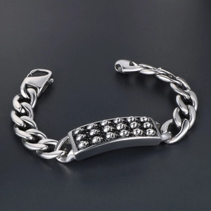 Bracciale punk in acciaio inossidabile con teschi e catena cubana da uomo