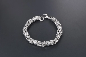 Detailed macro view of Byzantine chain link design on men stainless steel bracelet