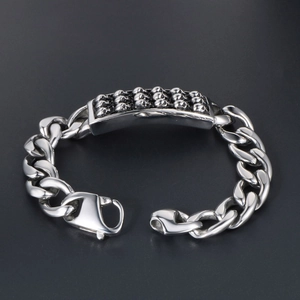 Bracciale punk in acciaio inossidabile argento con rilievi di teschi e maglia cubana