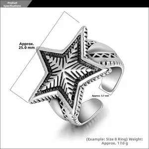 Macro shot of vintage star-shaped open ring featuring radiant snowflake texture and wide band