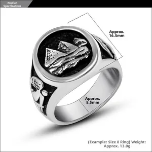 Detailed macro view of vintage titanium steel ring with Egyptian pyramid relief