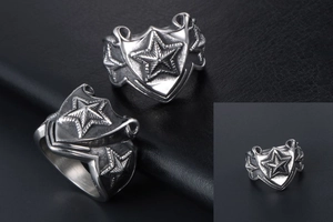 Detail of vintage star shield ring in stainless steel with antique silver finish