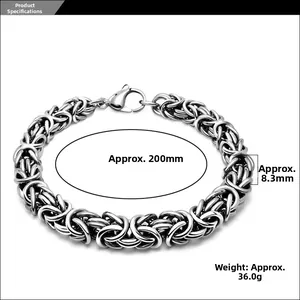 Macro detail of Byzantine style silver stainless steel braided chain with lobster clasp