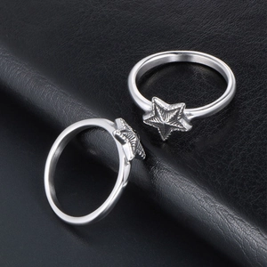 Paire de bagues en acier inoxydable pour couples avec motif étoile et finition argentée