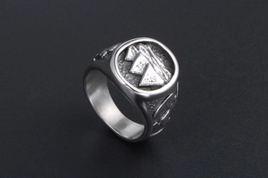 Detailed view of an ancient Egyptian pyramid relief on a vintage titanium steel signet ring