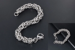 Detail of high-polished silver Byzantine weave chain bracelet with a durable lobster clasp