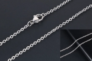 Detailed macro view of the silver titanium steel O-link chain with a secure lobster clasp