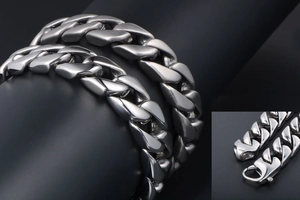 Detail view of men's titanium steel Cuban link chains showing polished and matte finishes