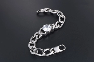 Macro shot of Cuban chain bracelet with a large round cubic zirconia and lobster clasp