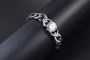 Close-up of silver titanium steel Cuban chain ring featuring a brilliant round diamond