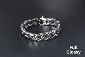 Detail of high-polished silver stainless steel curb chain bracelet with lobster clasp