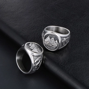 Retro titanium steel rings for men featuring Egyptian pyramid carvings on black leather