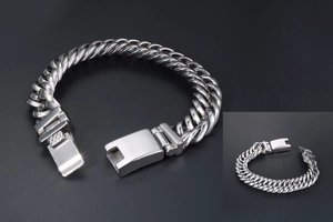Détail du bracelet gourmette en acier inoxydable poli avec un fermoir à boîte sécurisé