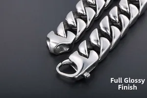 Macro shot of high-polished Cuban link bracelet featuring a large lobster clasp