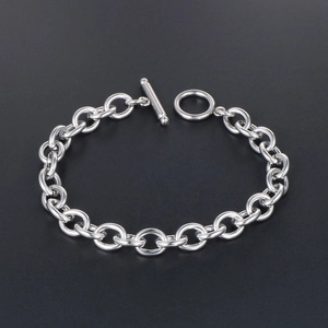 Minimalist silver titanium steel chain bracelet with a toggle clasp on black background