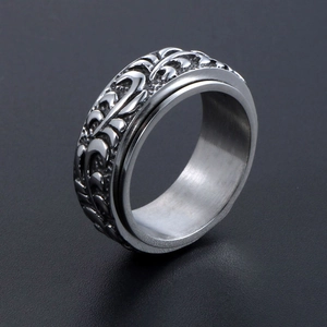 Bague spinner vintage en acier inoxydable avec motifs végétaux et intérieur poli lisse