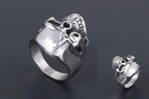 Detailed view of the vintage skull ring with silver finish and intricate carved metal texture
