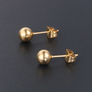Boucles d'oreilles boules dorées classiques en acier titane avec finition polie pour femme