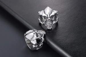 Detailed macro view of the intricate punk skull structure on a titanium steel ring for men